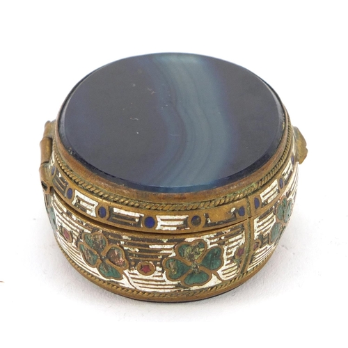 3183 - Oval enamelled brass and blue agate patch box with hinged lid, 5cm wide