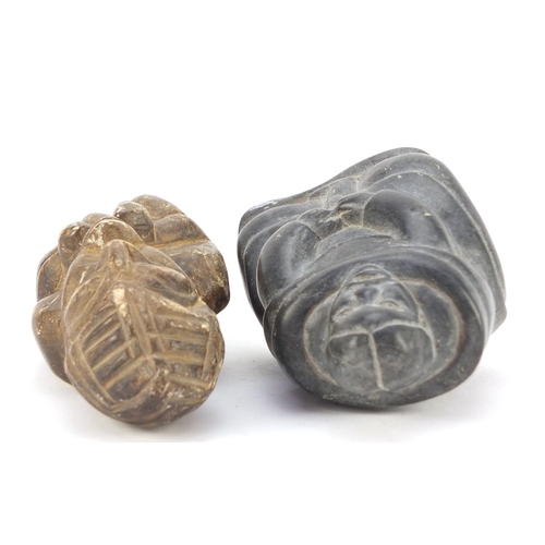 3833 - Canadian Inuit stone carving of an Eskimo and a South American stone carving of a figure, the larges... 