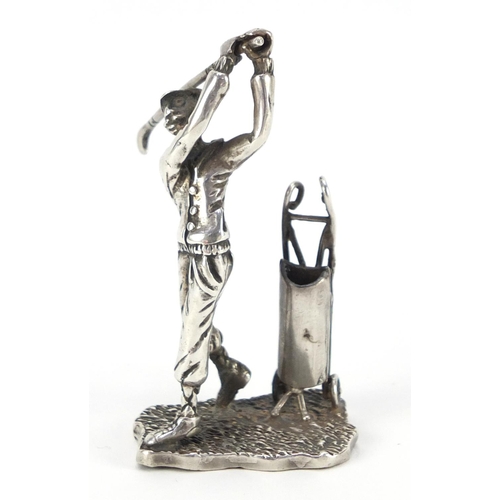 3338 - Silver figure of a golfer with caddy, indistinct impressed marks to the base, 6.5cm high, 31.8g