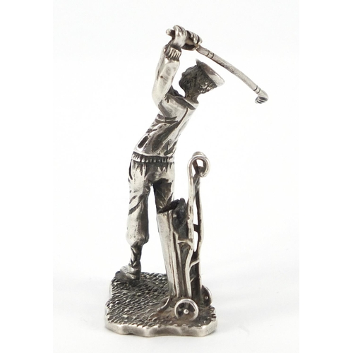 3338 - Silver figure of a golfer with caddy, indistinct impressed marks to the base, 6.5cm high, 31.8g