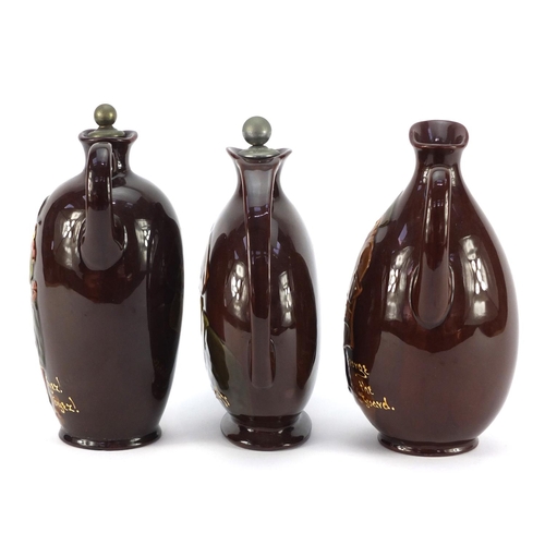 3253 - Three Royal Doulton Kingsware Dewar's whiskey decanters comprising George the Guard, Falstaff and Oy... 