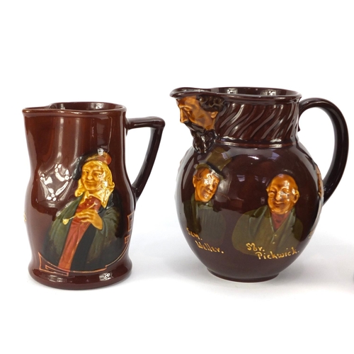 3483 - Three Royal Doulton Kingsware jugs, including an example decorated with Charles Dickens characters, ... 