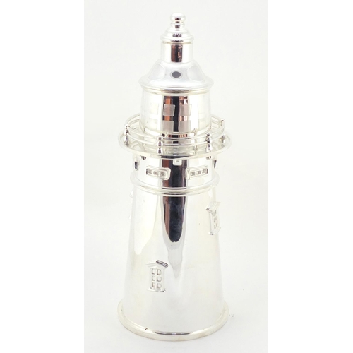 3357 - Large silver plated cocktail shaker in the form of a lighthouse, 36cm high