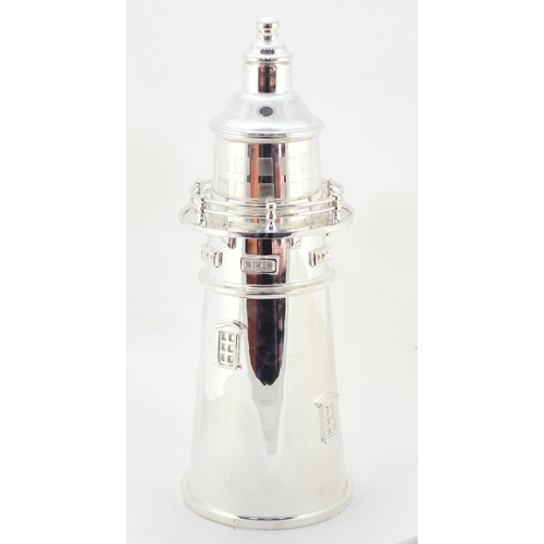 3357 - Large silver plated cocktail shaker in the form of a lighthouse, 36cm high