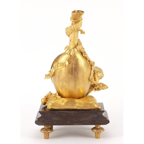 4003 - French Empire style gilt bronze table mirror in the form of putti with a mandolin, raised on a shape... 