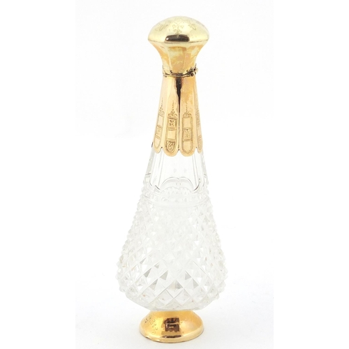 4001 - Dutch cut glass scent bottle with stopper and 18ct gold mounts, engraved with flowers, impressed mar... 