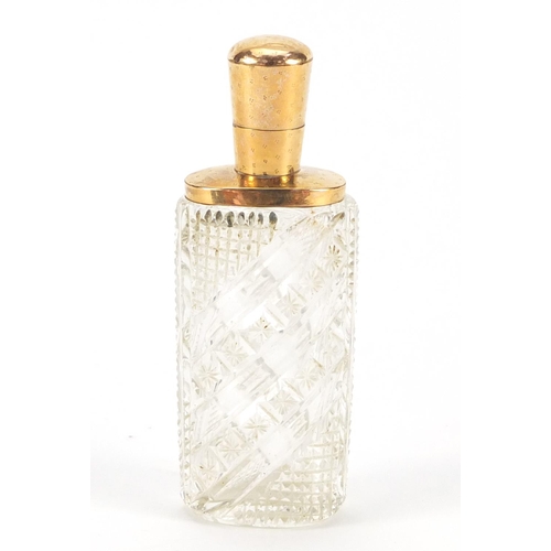 3182 - Dutch cut glass scent bottle with 18ct gold mounts and fitted leather case, impressed marks to the m... 