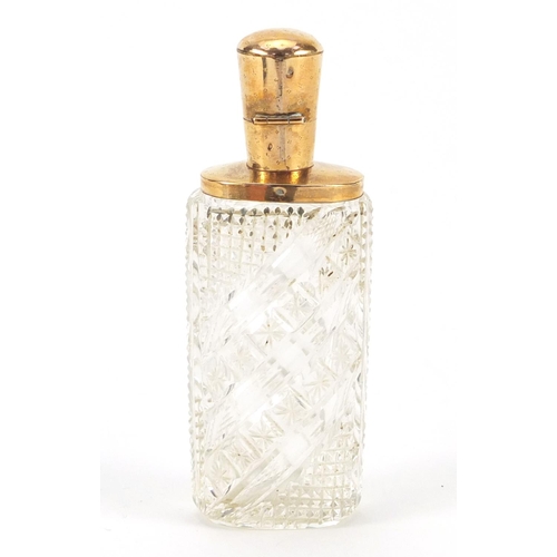 3182 - Dutch cut glass scent bottle with 18ct gold mounts and fitted leather case, impressed marks to the m... 