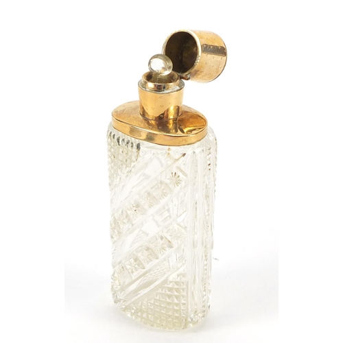 3182 - Dutch cut glass scent bottle with 18ct gold mounts and fitted leather case, impressed marks to the m... 