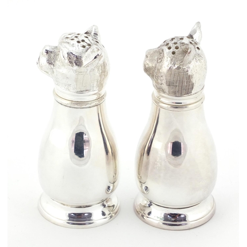 3729 - Novelty silver plated salt and pepper cellars in the form of a cat and dog, each 11cm high