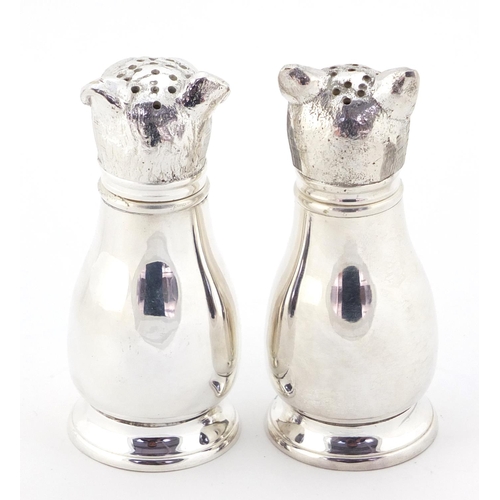 3729 - Novelty silver plated salt and pepper cellars in the form of a cat and dog, each 11cm high