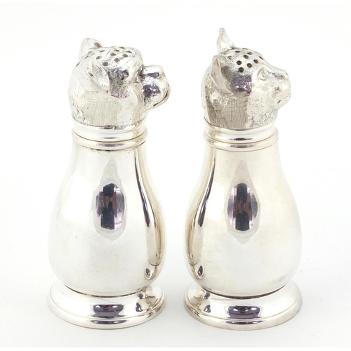 3729 - Novelty silver plated salt and pepper cellars in the form of a cat and dog, each 11cm high