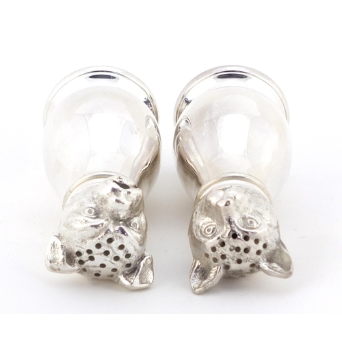 3729 - Novelty silver plated salt and pepper cellars in the form of a cat and dog, each 11cm high