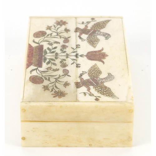 3992 - Set of carved bone playing cards housed in a box, carved with two birds and flowers, each card 3.1cm... 