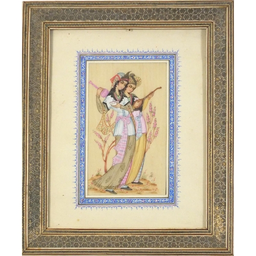 3131 - Rectangular Persian ivory plaque hand painted with two young females, signed with monogram, housed i... 