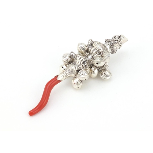 3986 - Victorian style unmarked silver babies rattle with whistle and coral handle, 14cm in length