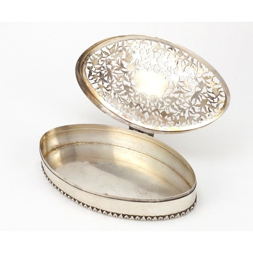 3227 - Edward VII oval silver box, retailed by Asprey & Co Ltd, the hinged lid pierced with flowers, Cheste... 