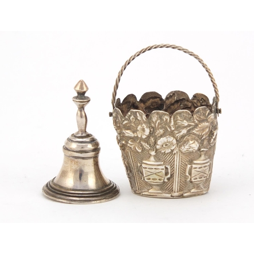 3663 - Victorian unmarked silver basket and a miniature silver bell, the largest 4cm high, 12.0g