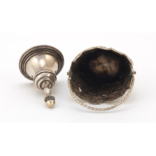 3663 - Victorian unmarked silver basket and a miniature silver bell, the largest 4cm high, 12.0g