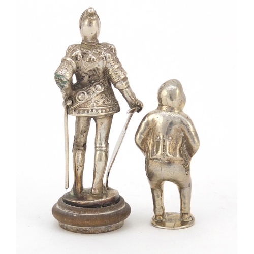 3604 - Two novelty silver figural pipe tampers, including a Knight in a suit of armour, the largest 5.8cm h... 