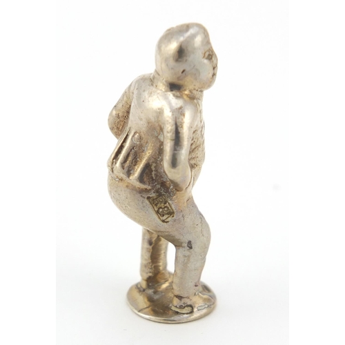 3604 - Two novelty silver figural pipe tampers, including a Knight in a suit of armour, the largest 5.8cm h... 