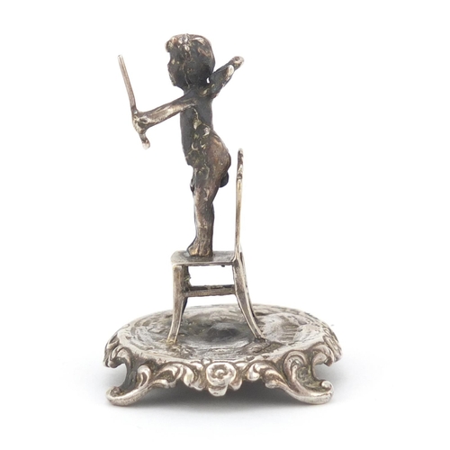 3458 - Edward VII silver model of a cherub standing on a chair, by Singleton Benda & Co Ltd, London 1902, 5... 