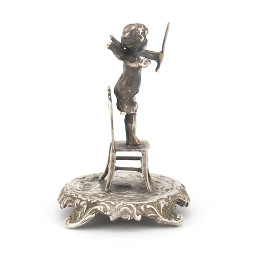 3458 - Edward VII silver model of a cherub standing on a chair, by Singleton Benda & Co Ltd, London 1902, 5... 