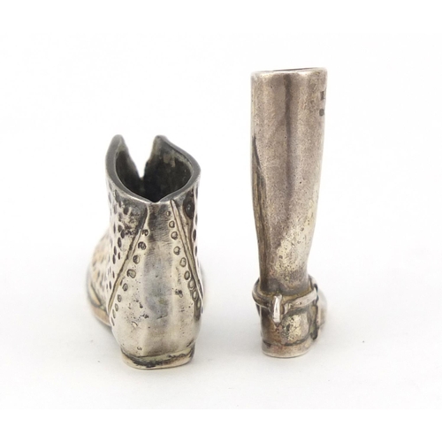 3661 - Novelty unmarked silver match striker in the form of a boot and an Italian silver boot, the largest,... 