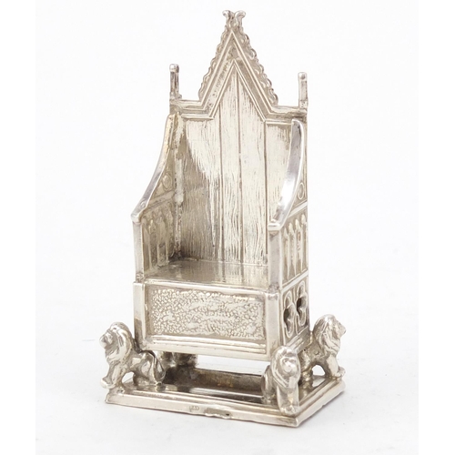 3228 - Miniature silver model of a throne chair with lion supports, indistinct hallmarks, 7.5cm high, 41.0g