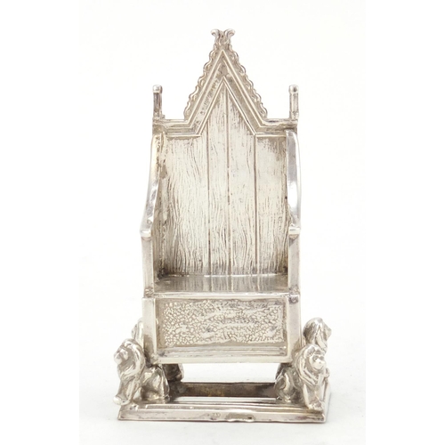 3228 - Miniature silver model of a throne chair with lion supports, indistinct hallmarks, 7.5cm high, 41.0g