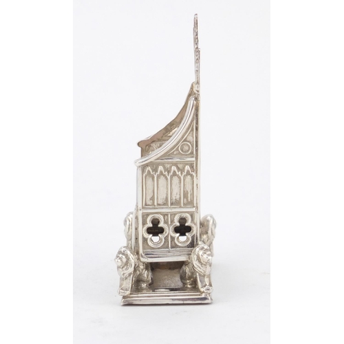 3228 - Miniature silver model of a throne chair with lion supports, indistinct hallmarks, 7.5cm high, 41.0g