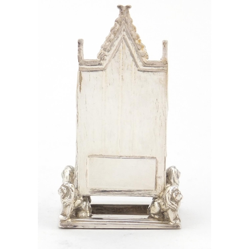 3228 - Miniature silver model of a throne chair with lion supports, indistinct hallmarks, 7.5cm high, 41.0g