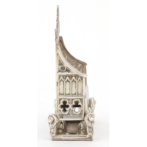 3228 - Miniature silver model of a throne chair with lion supports, indistinct hallmarks, 7.5cm high, 41.0g