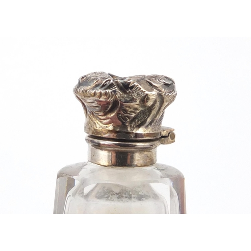 3185 - Victorian cut glass and unmarked silver double end scent bottle, housed in a leather case