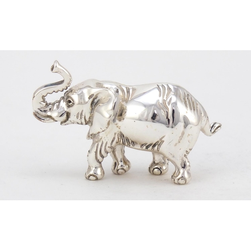 3727 - Miniature silver model of an elephant, hallmarked London 1942, 6cm in length, 52.0g