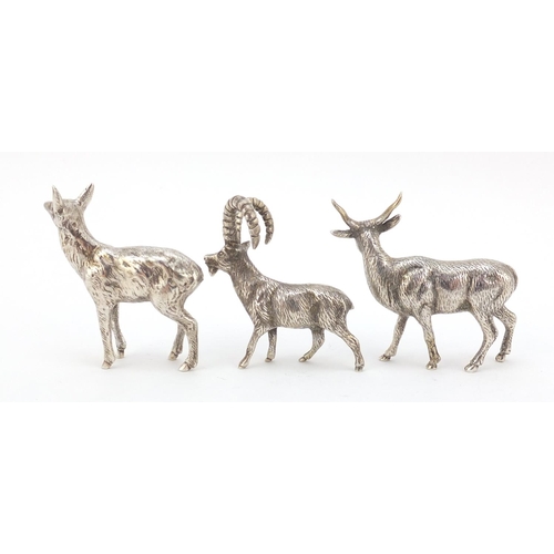 3869 - Three miniature silver animals including a long horn goat, the largest 5.5cm high, 113.0g