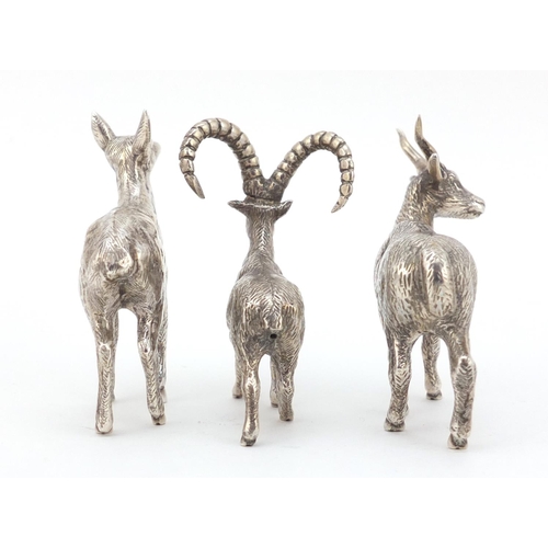 3869 - Three miniature silver animals including a long horn goat, the largest 5.5cm high, 113.0g