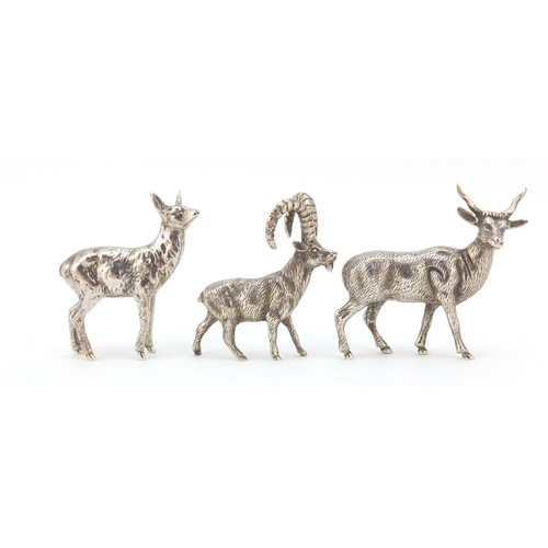 3869 - Three miniature silver animals including a long horn goat, the largest 5.5cm high, 113.0g