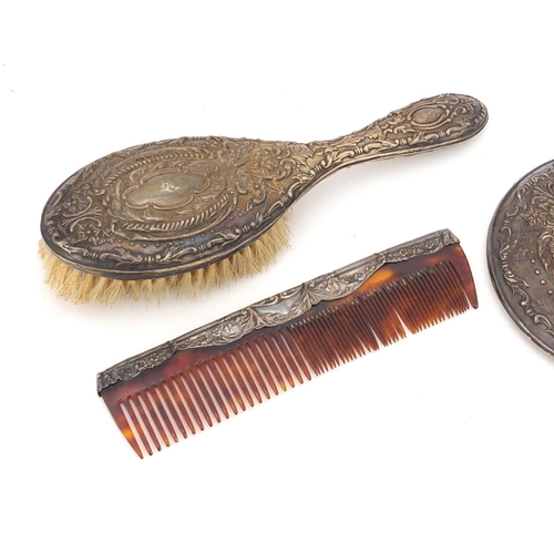 5233 - George V silver four piece vanity set comprising hand mirror, two brushes and comb, by Robert Pringl... 