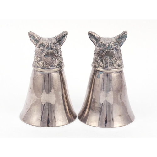3739 - Pair of silver plated dog's head stirrup cups, 8cm high