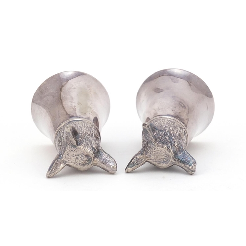 3739 - Pair of silver plated dog's head stirrup cups, 8cm high