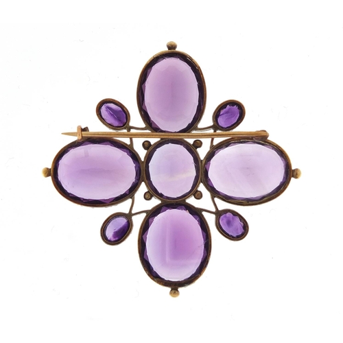 3102 - Victorian unmarked gold and amethyst brooch, 5.5cm wide, 20.4g