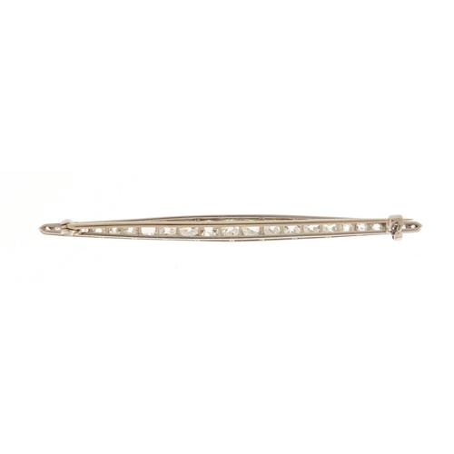 3027 - Good unmarked white metal graduated diamond bar brooch, 6.5cm in length, 4.7g, housed in a J Parks, ... 