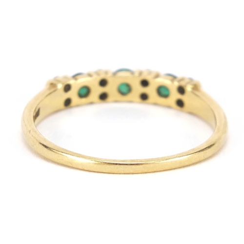 4244 - 18ct gold, emerald and diamond half eternity ring, size S, 2.6g