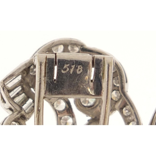 3322 - Pair of unmarked white metal diamond clip on earrings, 2.2cm in length, 8.2g