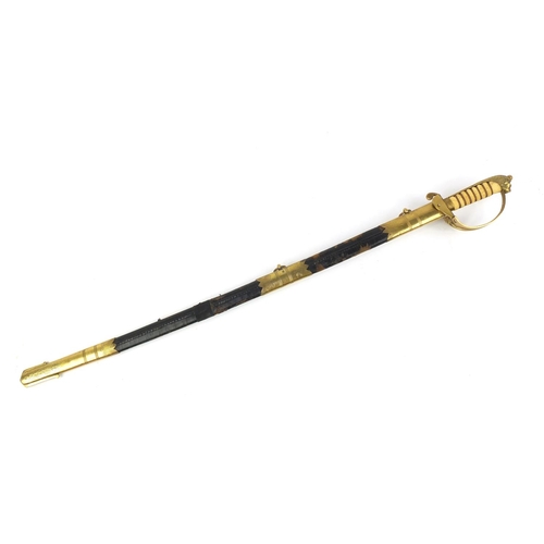 3532 - Victorian Naval Officer's sword with leather scabbard and engraved steel blade, 96.5cm in length