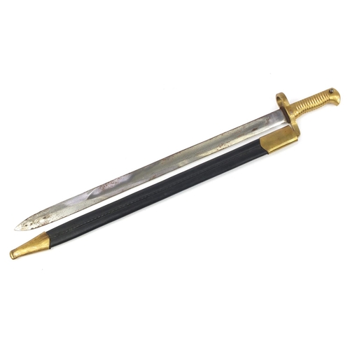 3533 - US military interest sabre bayonet with scabbard, 66.5cm in length