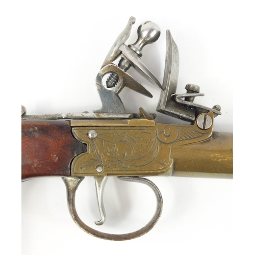 3202 - 19th century flintlock pocket pistol with walnut grip, 19.5cm in length