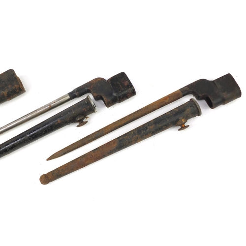 3537 - Three British military socket bayonets with scabbards, each 27.5cm in length