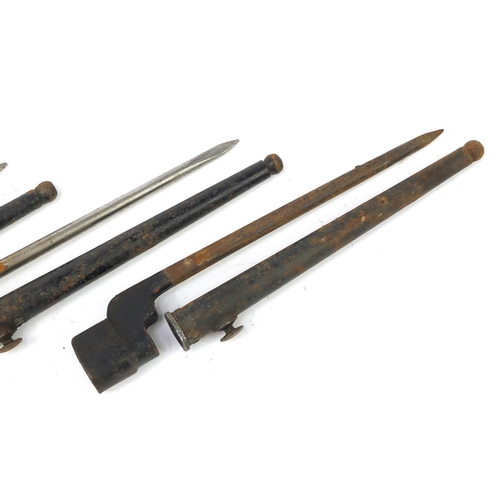 3537 - Three British military socket bayonets with scabbards, each 27.5cm in length